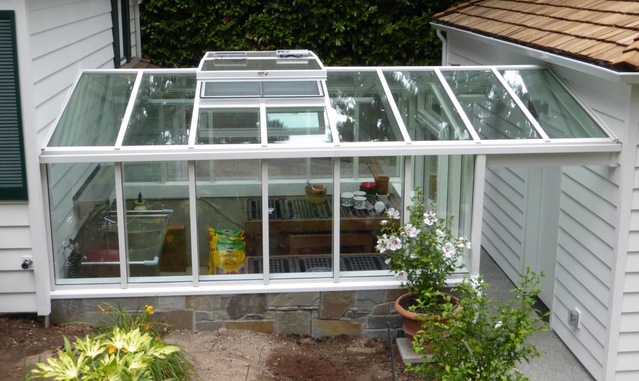 Greenhouse-style sunroom glass repair and replacement