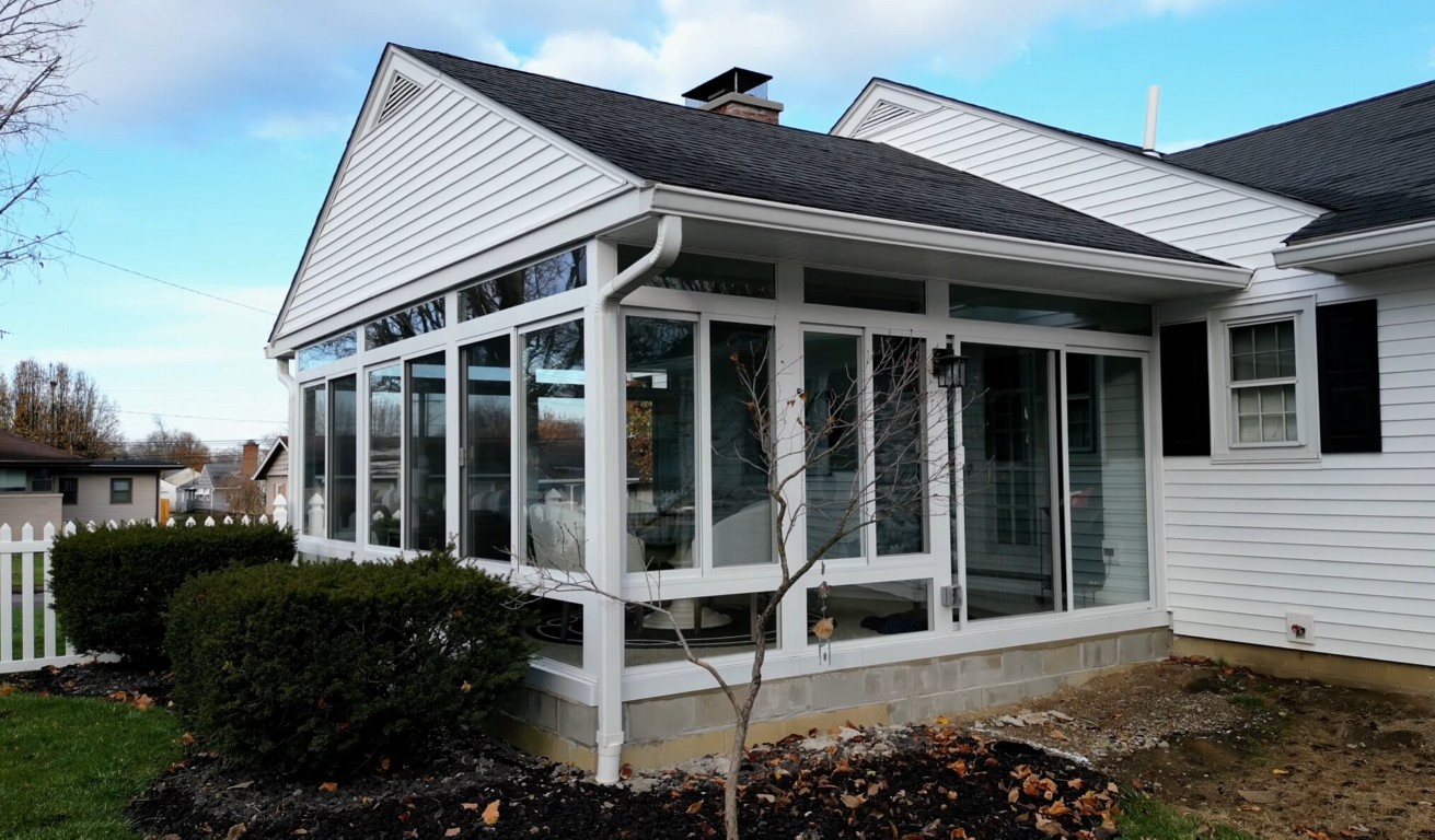 Custom sunroom with natural light and comfortable living space